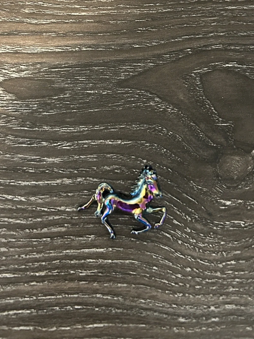 Iridescent horse brooch